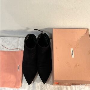 Miu Miu Black Women's Ankle Boots
Size 38,5